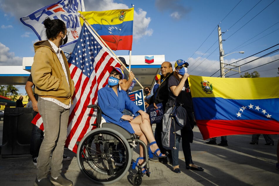 Hundreds of thousands of Venezuelans have had an extension to their temporary protected status in the US revoked by the Trump administration.