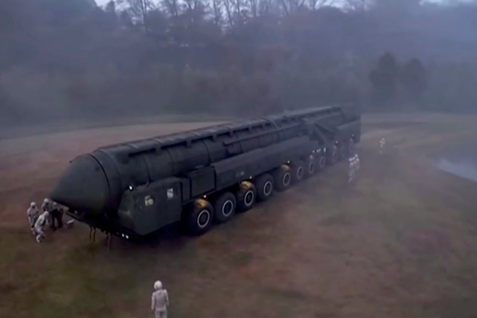 A screengrab obtained from a video released on November 1, 2024, shows what North Korea says is a mobile missile launcher vehicle parked at an undisclosed location.