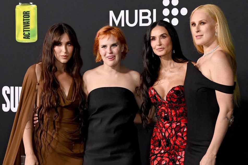 (From l. to r.) Scout LaRue Willis, Tallulah Willis, Demi Moore, and Rumer Willis attend the Los Angeles Premiere of The Substance at Directors Guild Of America on September 16, 2024 in Los Angeles, California.