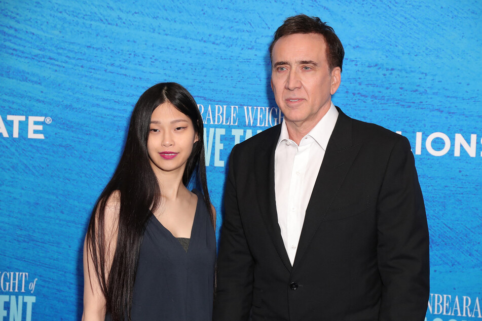 Nicolas Cage (r.) and his wife Riko Shibata have become parents together for the first time.