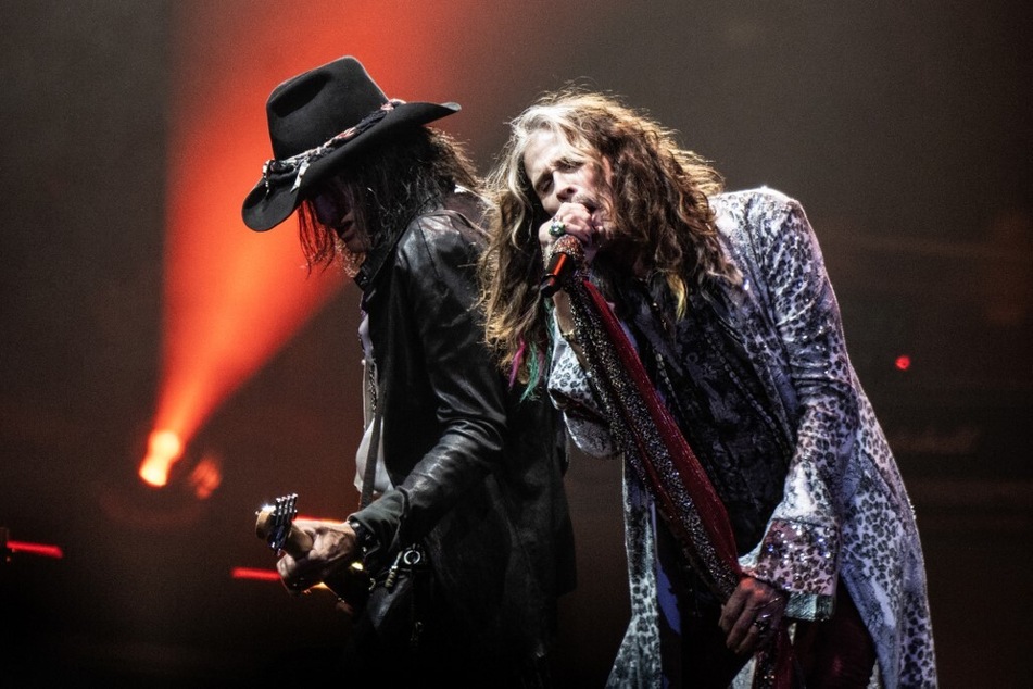 Joe Perry (l.) and Steven Tyler of Aerosmith perform live on stage at the Wells Fargo Center on September 2, 2023, in Philadelphia, Pennsylvania.