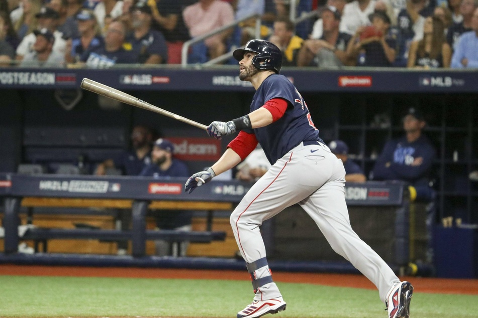 J.D. Martinez hit the first of two historic grand slams in game two of the ALCS on Saturday.