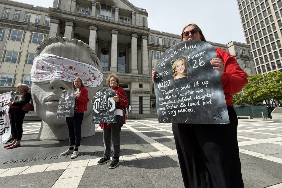 Family members of opioid overdose victims protest outside the US District Court for the District of New Jersey in Newark on April 28, 2026.