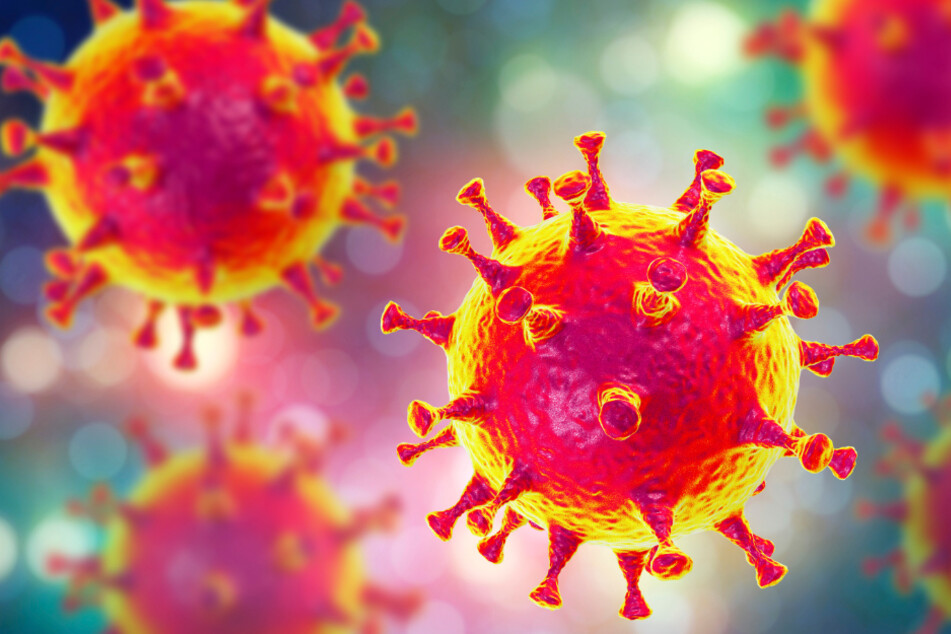 Stark vergrößert würde das Coronavirus unter einem Mikroskop seine namengebenden Kronen zeigen. (Illustration)