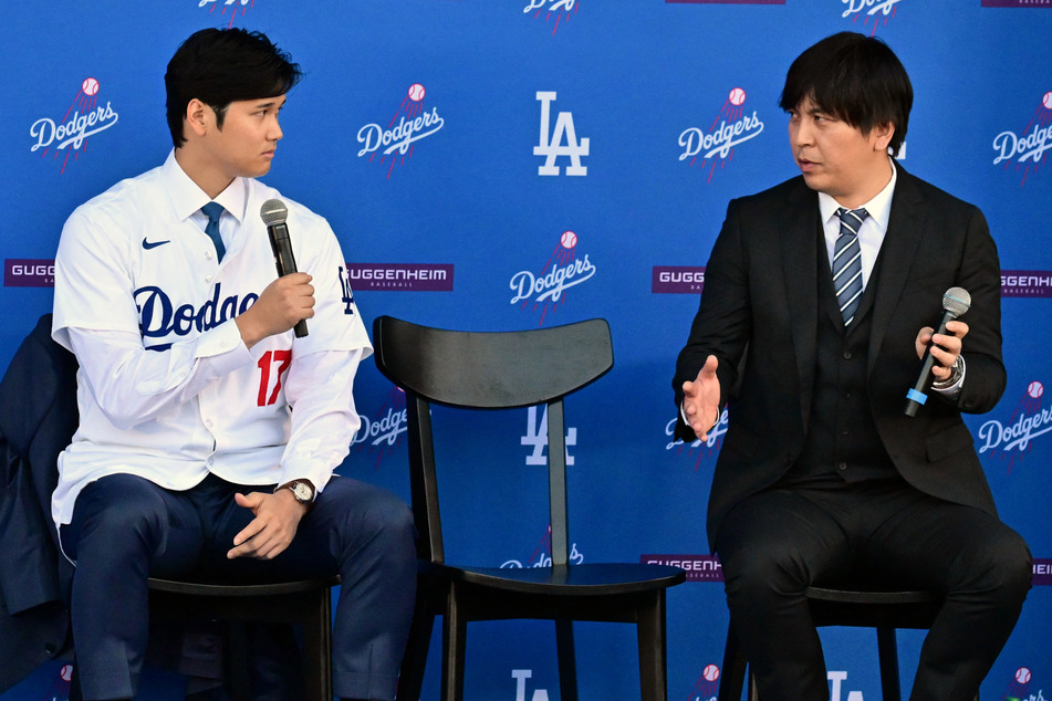 Ippei Mizuhara (r.) has been Shoehei Ohtani's interpreter since the superstar signed with the Los Angeles Angels in 2017.