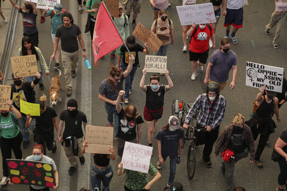 Abortion rights activists march during a pro-choice rally near the Tucson Federal Courthouse in Tucson, Arizona, on July 4, 2022.