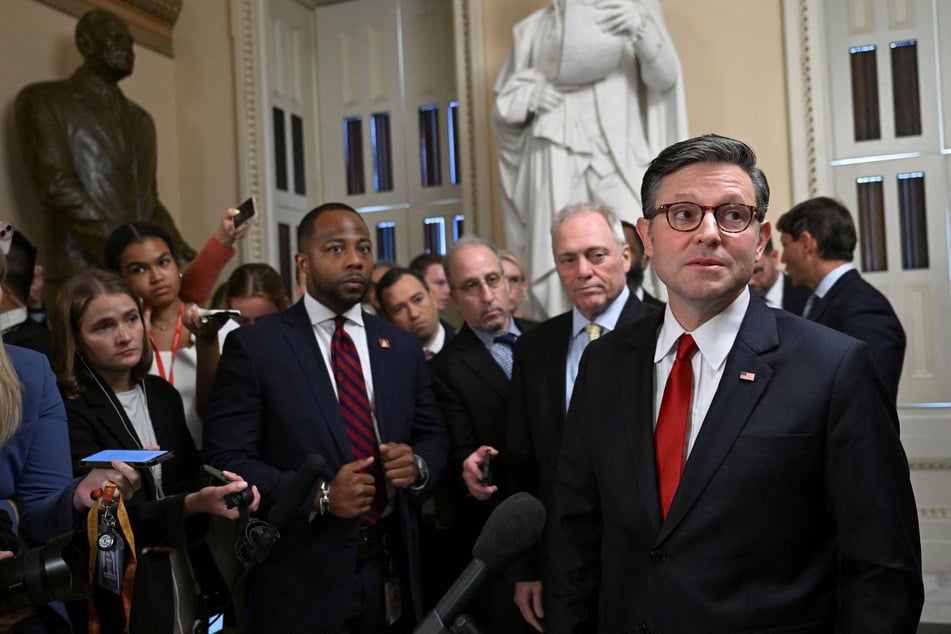 Speaker of the House Mike Johnson talks to the press as Republican lawmakers struggle to pass President Donald Trump's sweeping spending and tax bill on July 2, 2025.