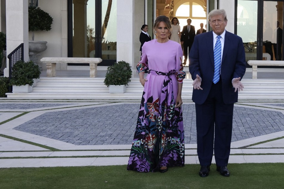 Donald Trump and his wife Melania attend a campaign fundraising event at the home of billionaire hedge fund manager John Paulson in Palm Beach, Florida.
