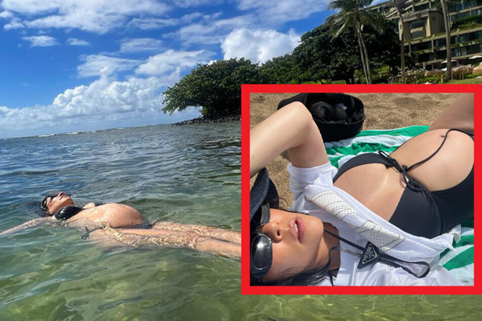 Kourtney Kardashian seems to be having a blast while chilling out and showing off her baby bump in Hawaii.