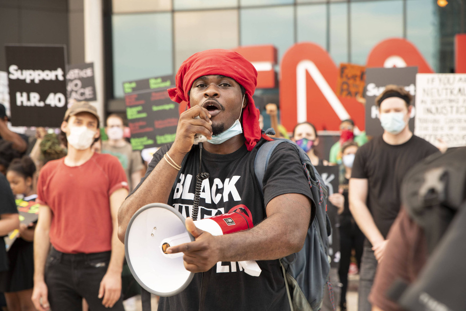 Protesters participate in a Rally for reparations in Atlanta, Georgia.