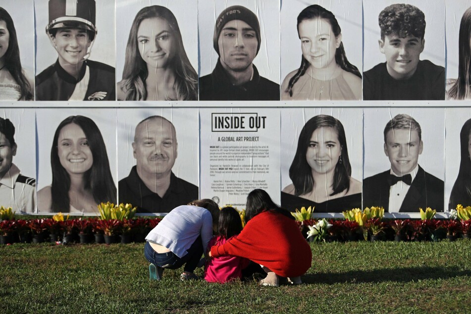 People honor the memory of the Parkland school shooting victims on the fourth anniversary of the tragedy.