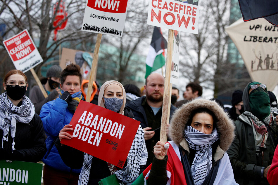 Protestors rally for a ceasefire in Gaza outside a UAW union hall during a visit by President Joe Biden in Warren, Michigan.