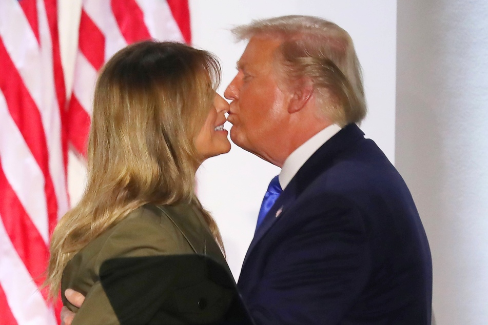 Donald Trump (r.) kissing Melania Trump after the first lady delivered a speech during the Republican National Convention in August 2020.