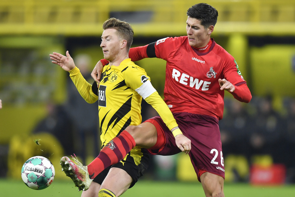 Kölns Sava-Arangel Cestic (19, r.) im Zweikampf mit Dortmunds Marco Reus. Der Vertrag des Innenverteidigers wurde bis 2024 verlängert.