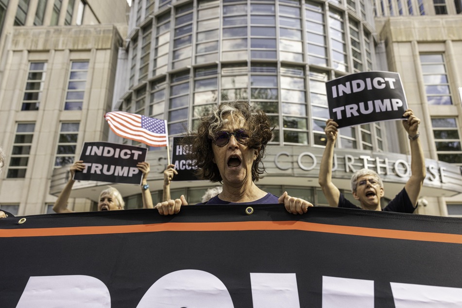 Protestors gathered outside the Brooklyn Federal Courthouse on Tuesday.