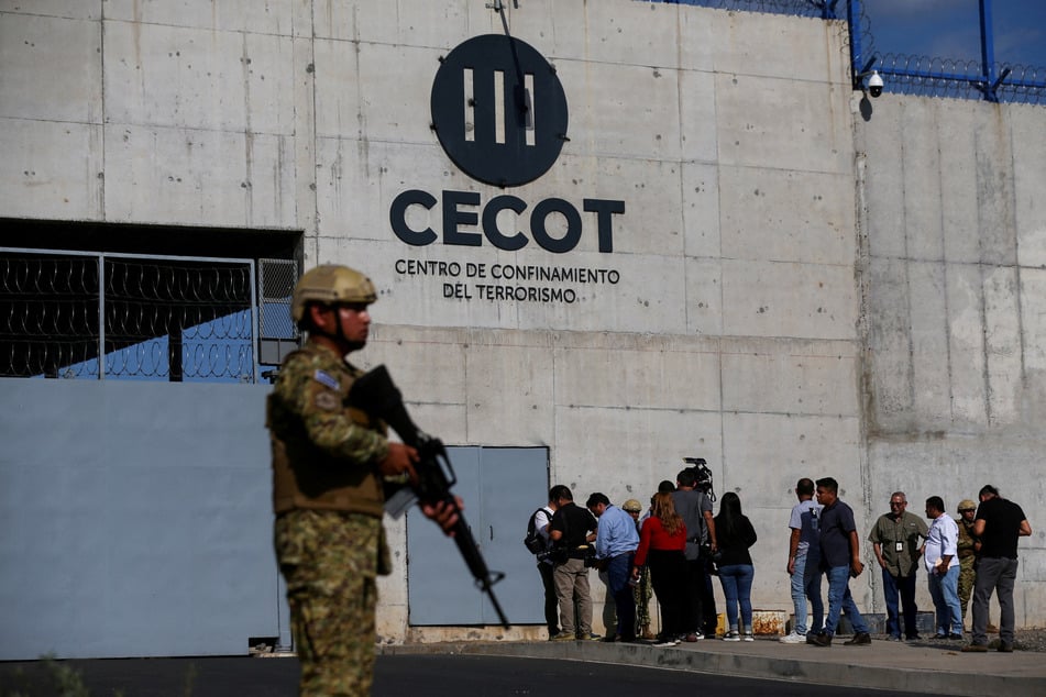 A Salvadoran soldier stands guard outside the Terrorism Confinement Center (CECOT) prison in Tecoluca, El Salvador.