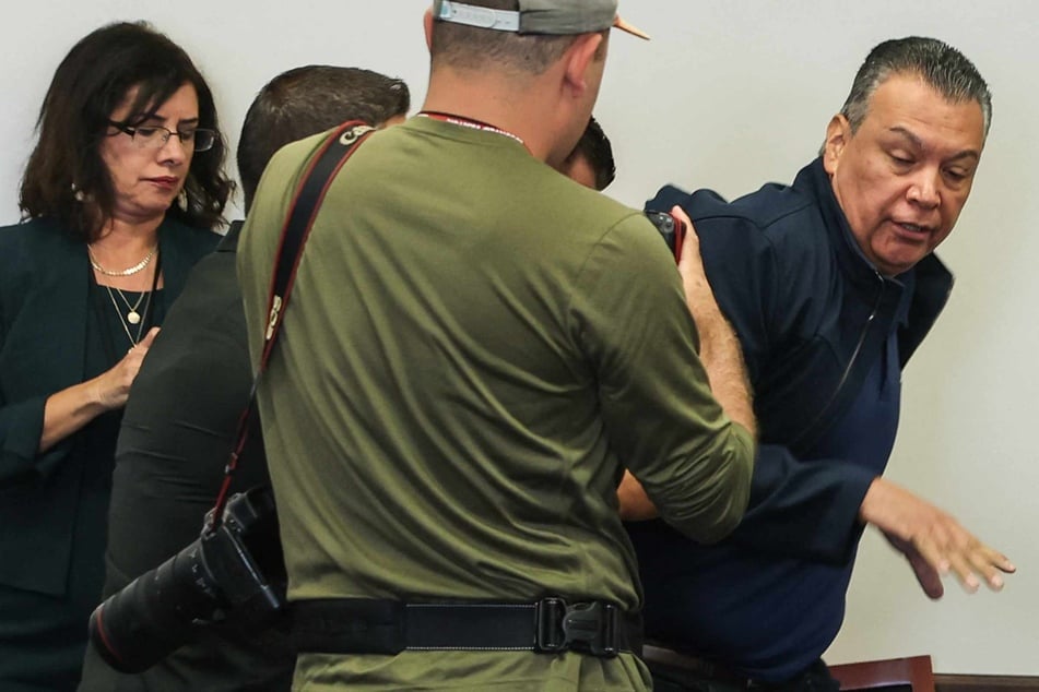 Shocking footage shows US senator being physically removed from Kristi Noem press conference