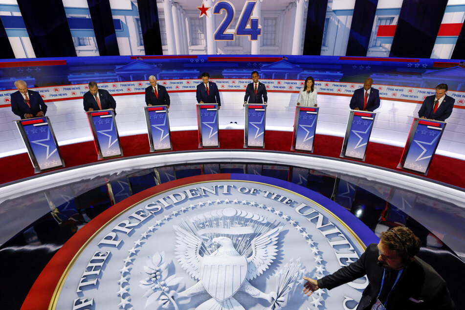 From l. to r.: Asa Hutchinson, Chris Christie, Mike Pence, Ron DeSantis, Vivek Ramaswamy, Nikki Haley, Tim Scott, and, Doug Burgum at the Republican Party's first primary debate.