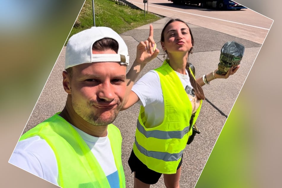 Ekaterina Leonova (38) postete ein Bild von sich und ihrem Partner in Warnweste, was auf eine mögliche Autopanne hindeutet.