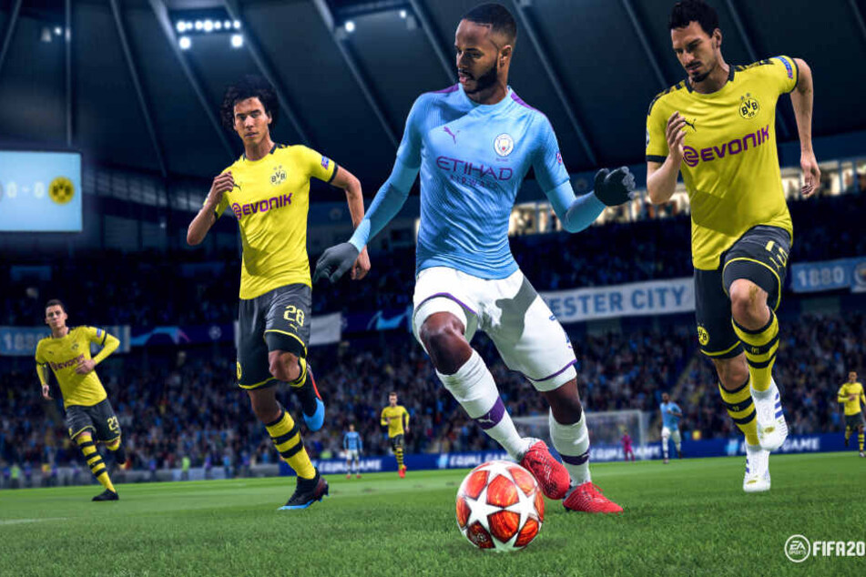 Manchester Citys Raheem Sterling (am Ball) im Laufduell mit den BVB-Spielern Axel Witsel (links) und Mats Hummels.