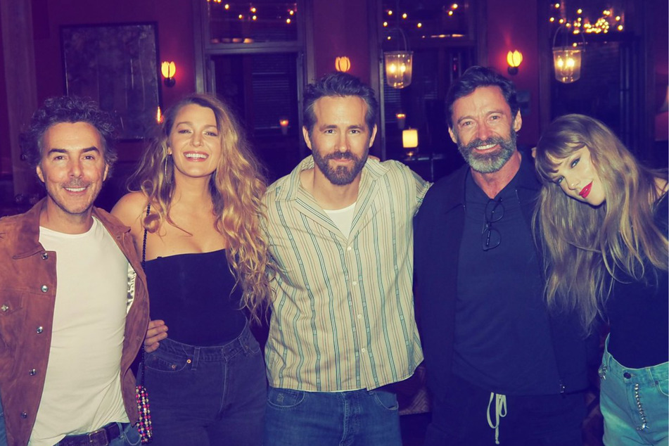 (From l. to r.) Shawn Levy, Blake Lively, Ryan Reynolds, Hugh Jackman, and Taylor Swift attend a Jets-Chiefs game in October 2023.