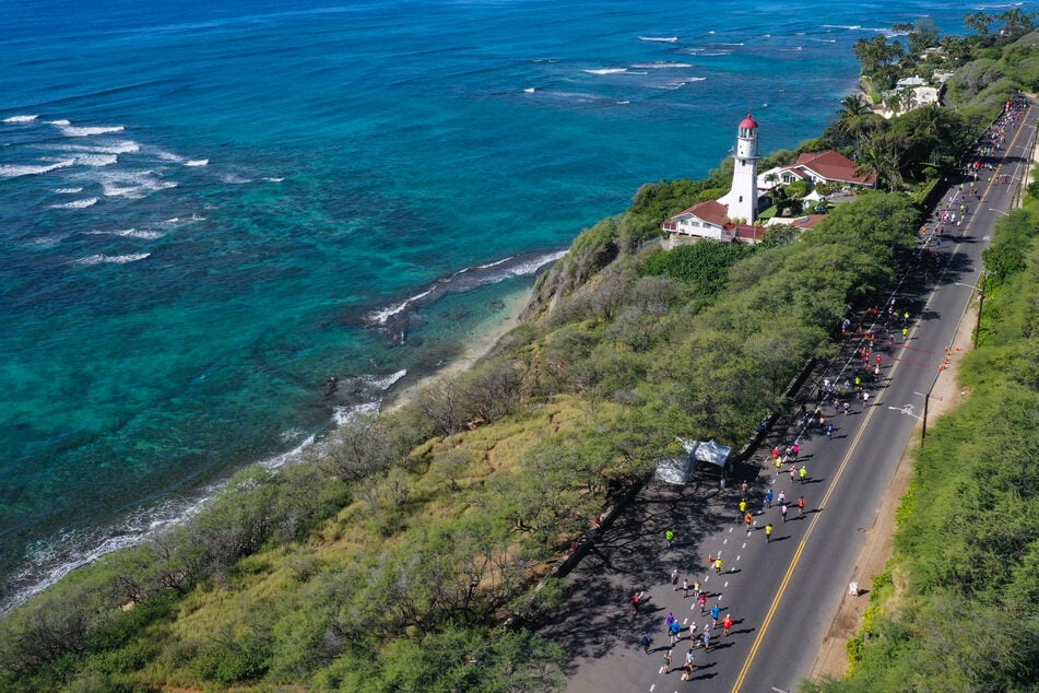 Hawaii lawmakers have passed a "first of its kind" bill that increases the state's hotel tax to fund climate change relief efforts, the governor's office said.
