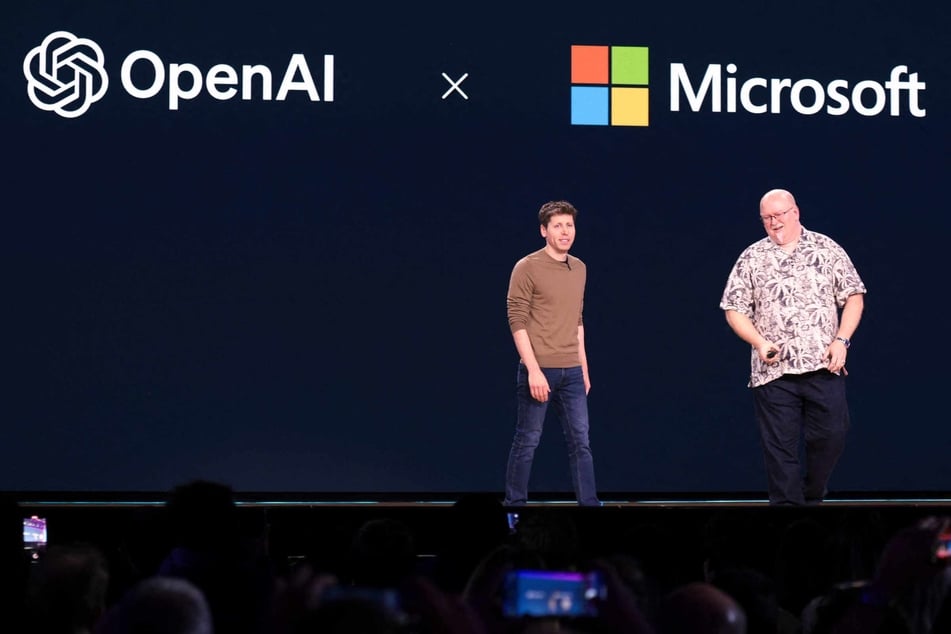 OpenAI CEO Sam Altman (l.) and Microsoft Chief Technology Officer and Executive VP of Artificial Intelligence Kevin Scott (r.) speak during the Microsoft Build conference at the Seattle Convention Center Summit Building in Seattle, Washington on May 21, 2024.