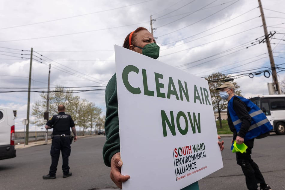 Demonstrators are shown at the Passaic Valley Sewage Commission during a march for clean air the Ironbound section of Newark, New Jersey, in April 2024.