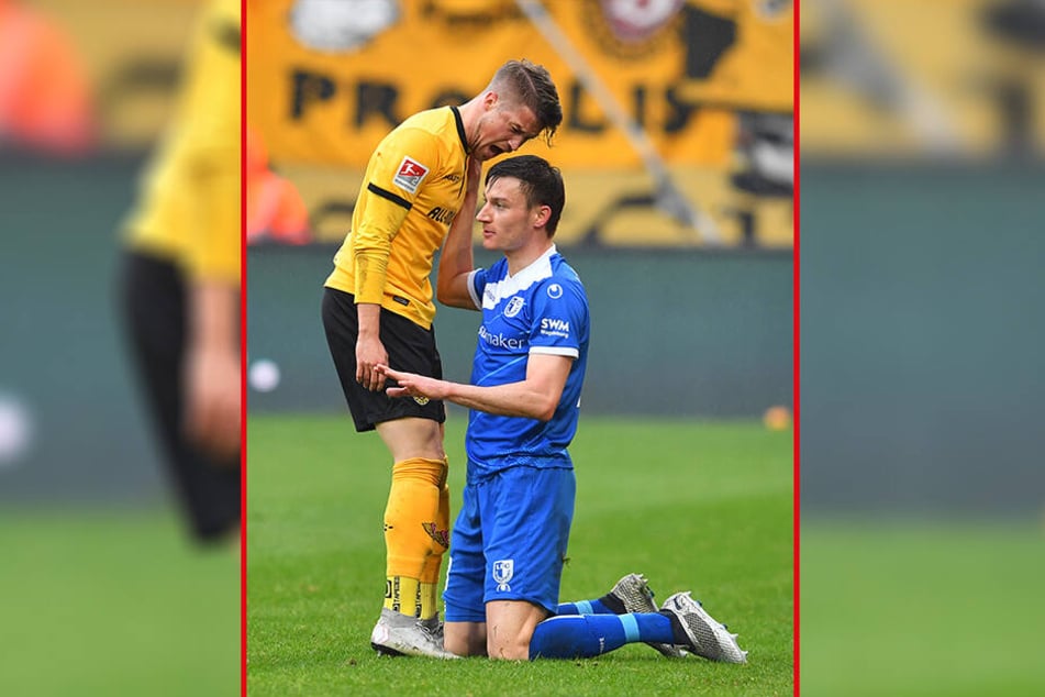 "Was soll das?" oder wenn Blicke töten könnten: Aus Sorge um seine Gesundheit war Dynamos Patrick Möschl (l.) stinksauer auf Magdeburgs Charles-Elie Laprevotte ...