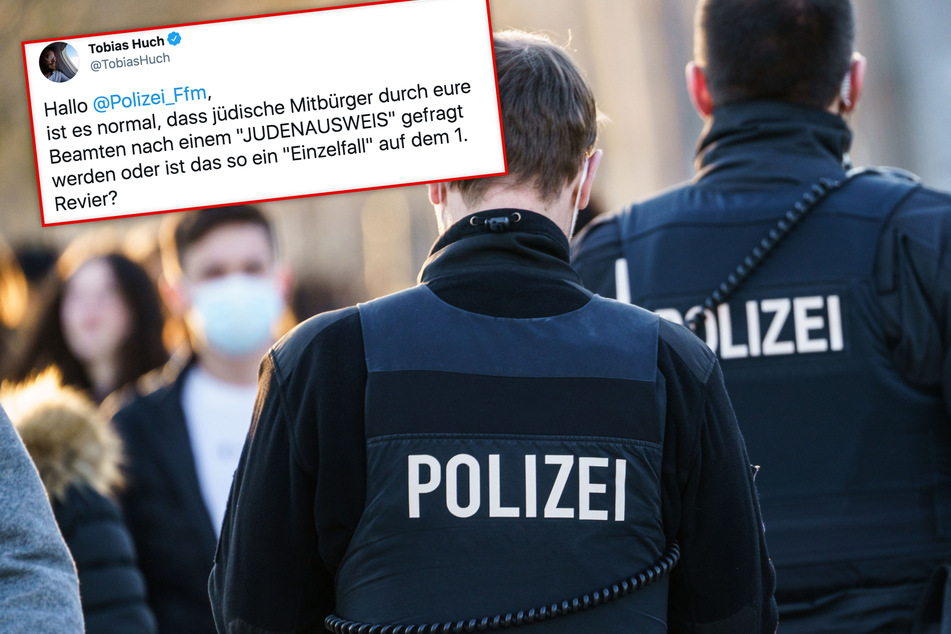 Zwei Polizisten laufen durch die Innenstadt von Frankfurt am Main. Journalist Tobias Huch veröffentlichte auf seinem Twitter-Kanal einen möglichen neuen Polizei-Skandal in der Mainmetropole.