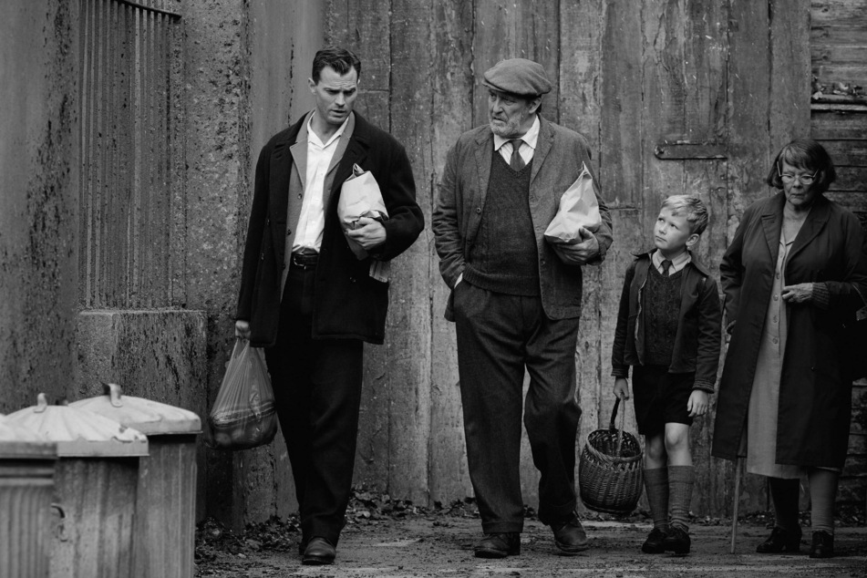 Jamie Dornan (l.) in Belfast, which won best screenplay at the Golden Globes.