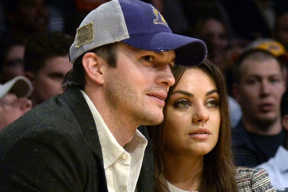 Ashton Kutcher und Mila Kunis bei einem Basketballspiel der Los Angeles Lakers.