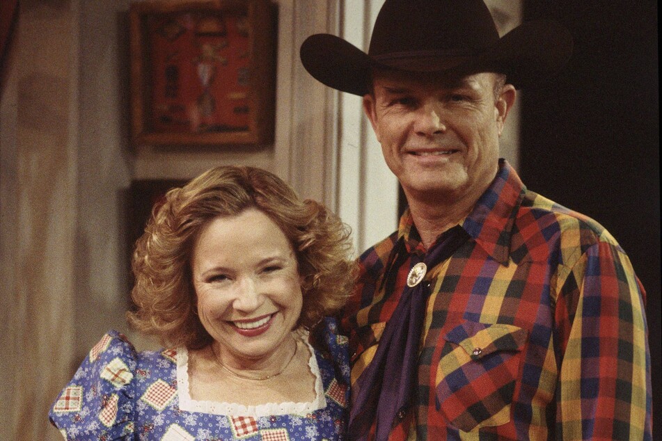 Kurtwood Smith (r) and Debra Jo Rupp reprise their roles as the lovable but stern Red and Kitty Forman in Netflix's That '90s Show.