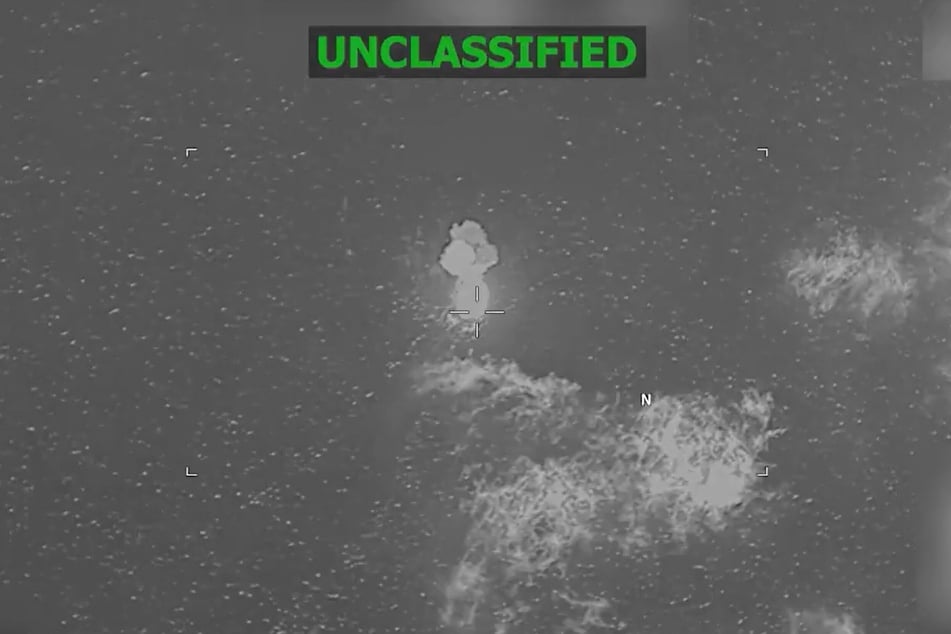 This screen grab from a video posted on the X account of US Southern Command shows a vessel that was struck by American forces on May 8, 2026.