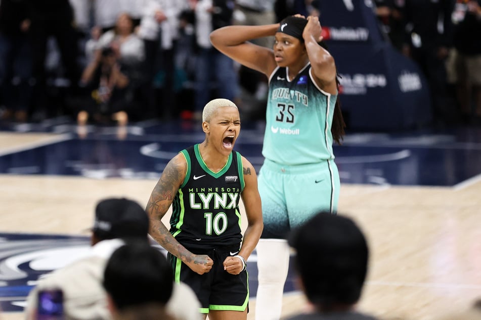 Minnesota Lynx guard Courtney Williams celebrates against the New York Liberty during the second half of game four of the 2024 WNBA Finals at Target Center.