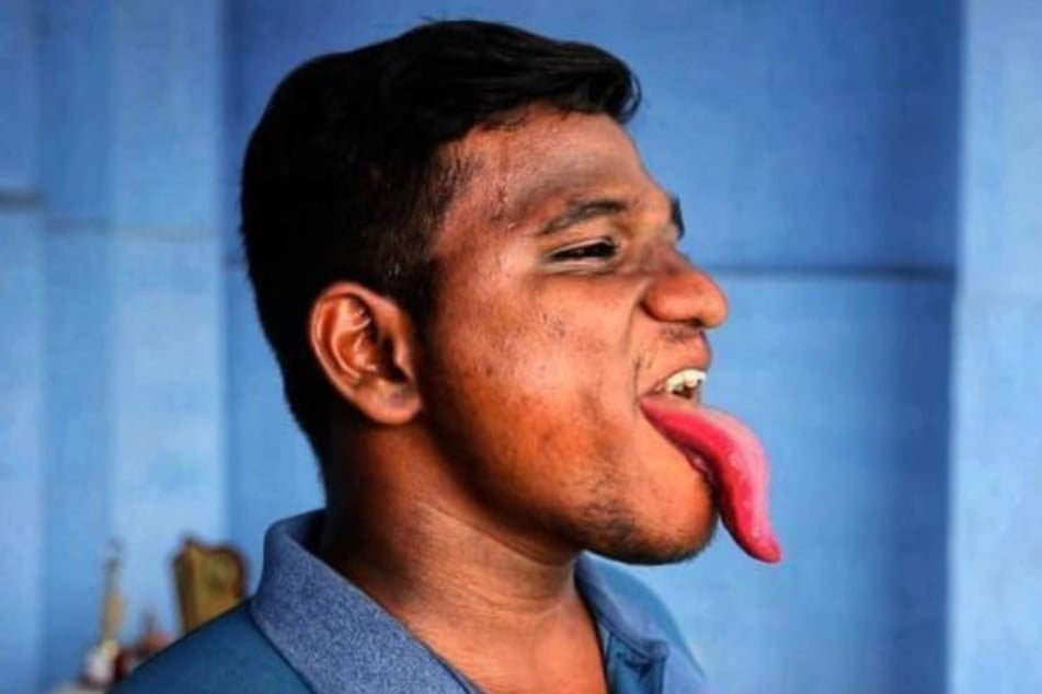 10,8 Zentimeter lang ist die Zunge von Praveen Kalirajan (20) - damit bricht er alle Rekorde.