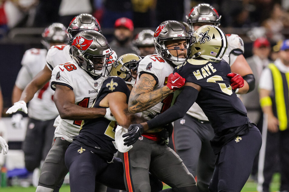 New Orleans Saints cornerback Marshon Lattimore and safety Marcus Maye (r.) got into a penalty with Tampa Bay Buccaneers wide receiver Mike Evans (second from r) on Sunday night.