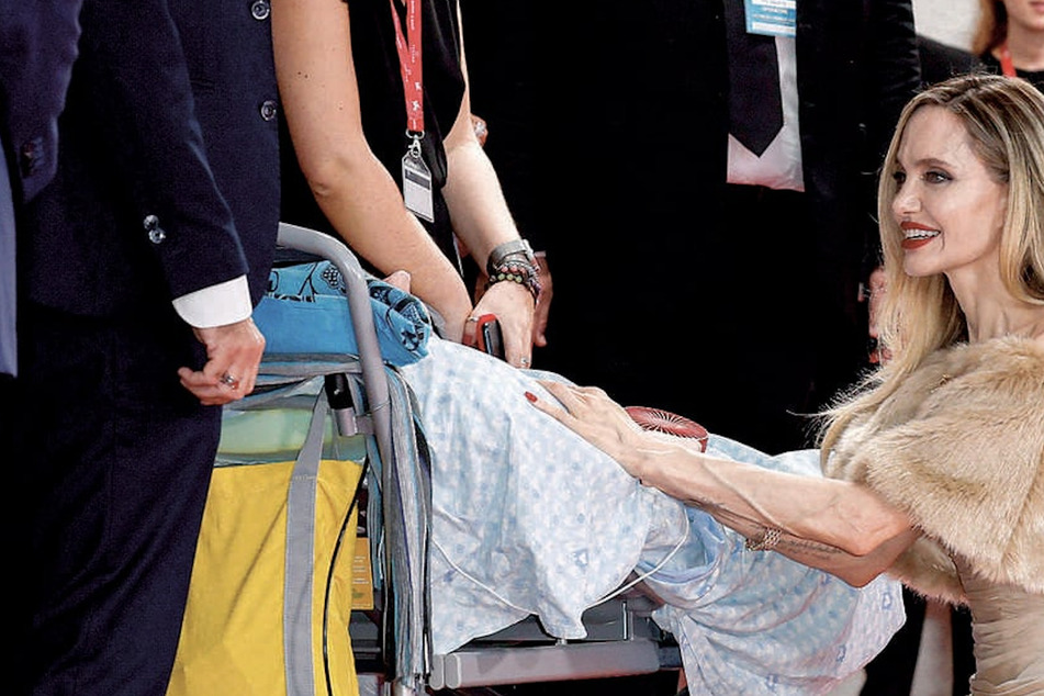 Angelina Jolie melts hearts after meeting with terminally ill fan on Maria red carpet