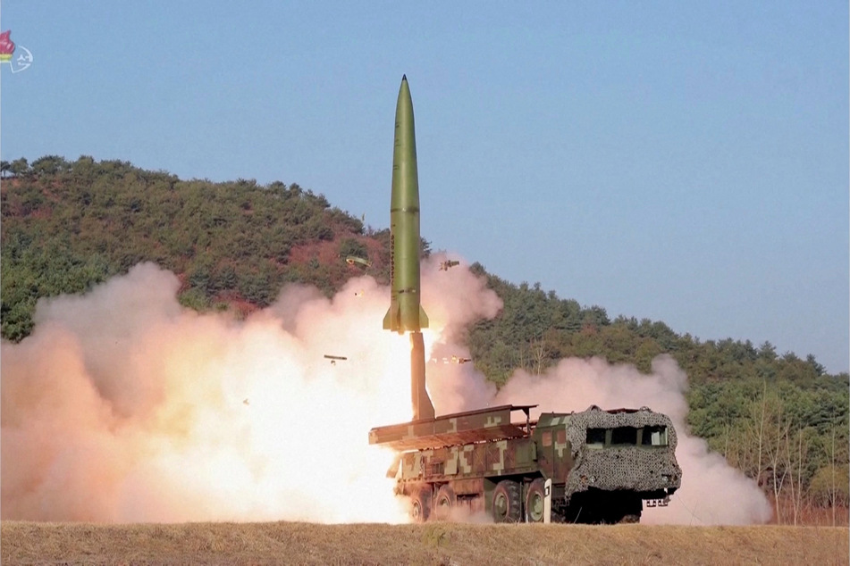 A screen grab shows shows a recent North Korean ballistic missile launch at an undisclosed location.