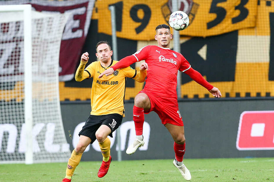 Ihn würde sein Trainer am liebsten klonen: Dynamos Jannik Müller (l.), hier gegen Kiels Heinz Mörschel, ist vielseitig einsetzbar.