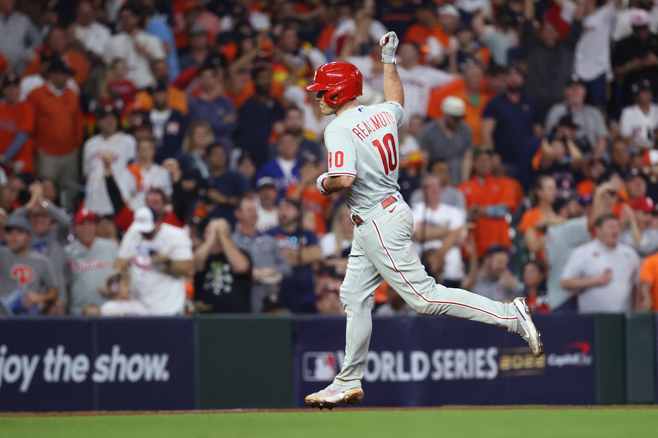 Philadelphia Phillies catcher J.T. Realmuto rounds the bases after hitting a home run during the tenth inning against the Houston Astros.
