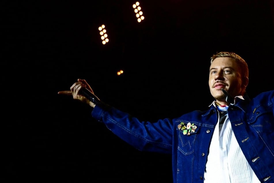 Macklemore has announced he is canceling an upcoming concert in Dubai in solidarity with the people of Sudan.