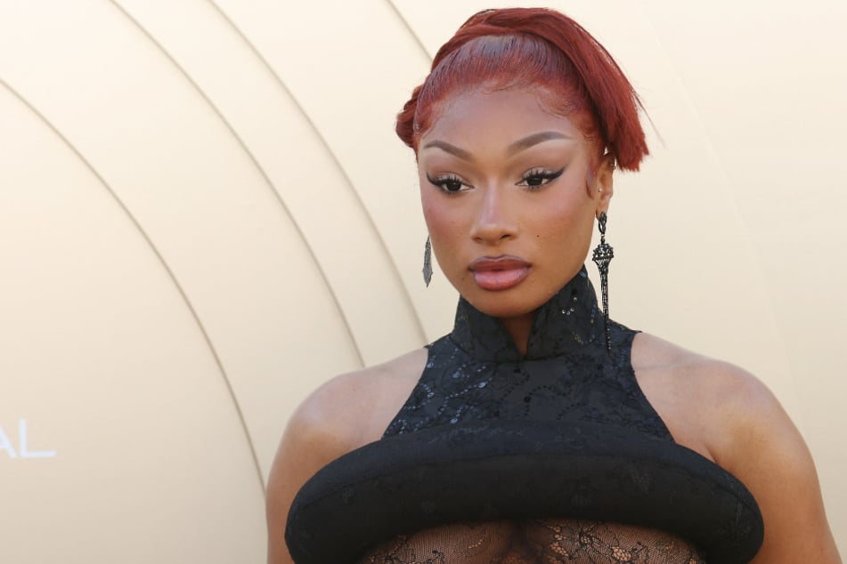 Megan Thee Stallion is facing more legal heat as a judge rules her former cameraman's shocking lawsuit can proceed.
