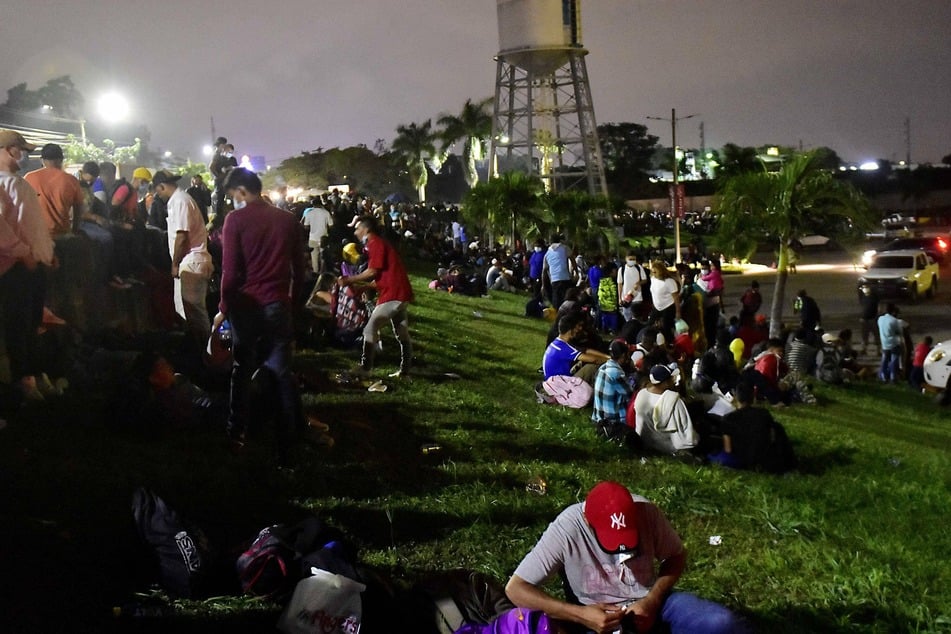 A group of hundreds of Hondurans rest as they prepare to leave in a new migrant caravan at the Gran Central Metropolitana in San Pedro Sula.