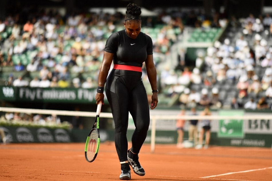 In her first Grand Slam after having her first child, Olympia Ohanian, Williams wore a Black catsuit with a bright red waistband designed by Nike.