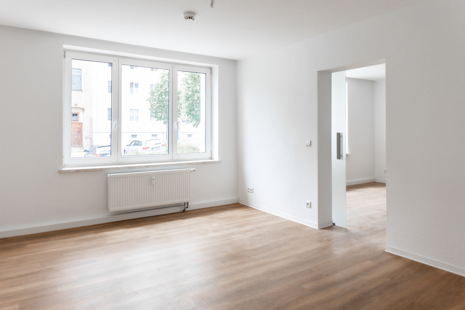 Wohn- & Essbereich mit Schiebetür in der 6-Zimmer-Wohnung