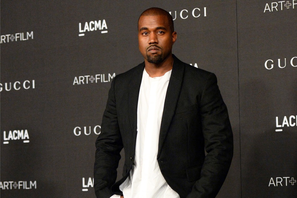 A former security guard at Kanye West's Donda Academy is suing the rapper over alleged racial discrimination and wrongful termination.
