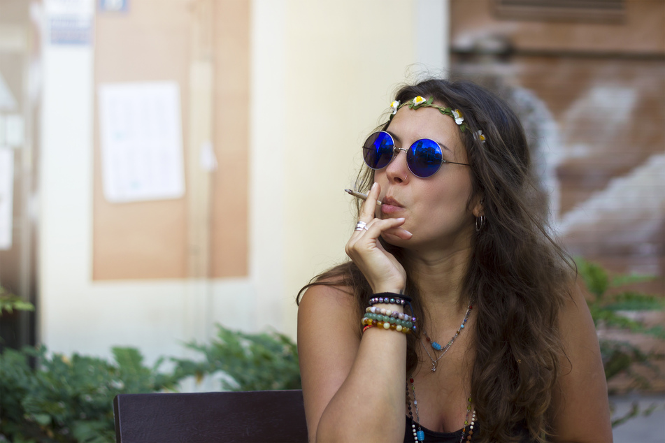 In New York, adults 21 and over can possess and publicly consume marijuana in public (stock image).