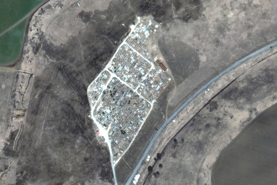 New satellite images show a possible mass grave outside Mariupol.