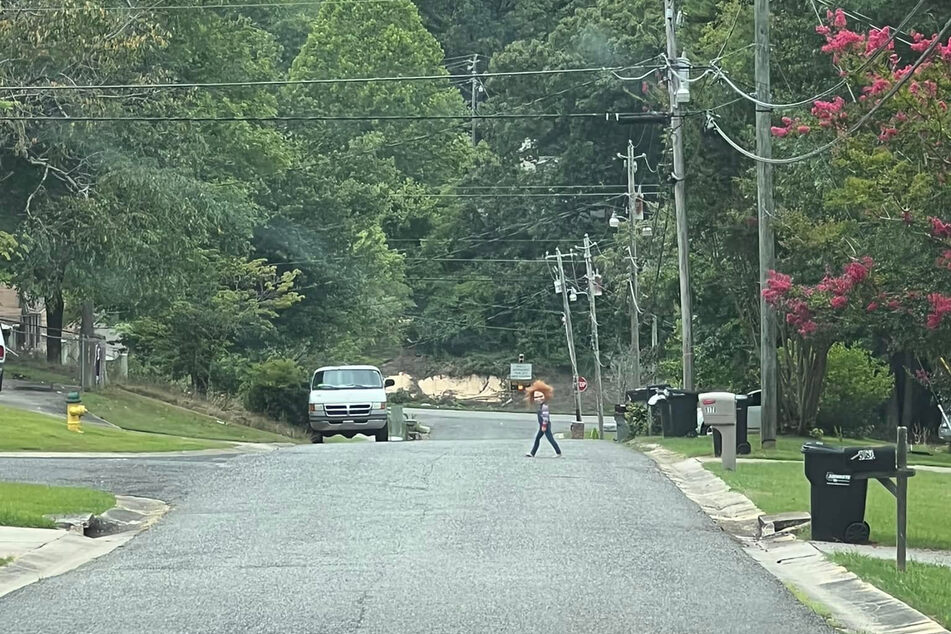 Turns out the little horror was a five-year-old doing a neighborhood watch in a Chucky Halloween costume.